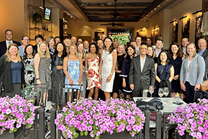 Founder & CEO, Rebecca Corbin at a dinner with the Corbin Team and invited guests