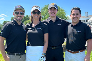 Founder & CEO, Rebecca Corbin with Corbin Team members at a charity tournament for Habitat for Humanity