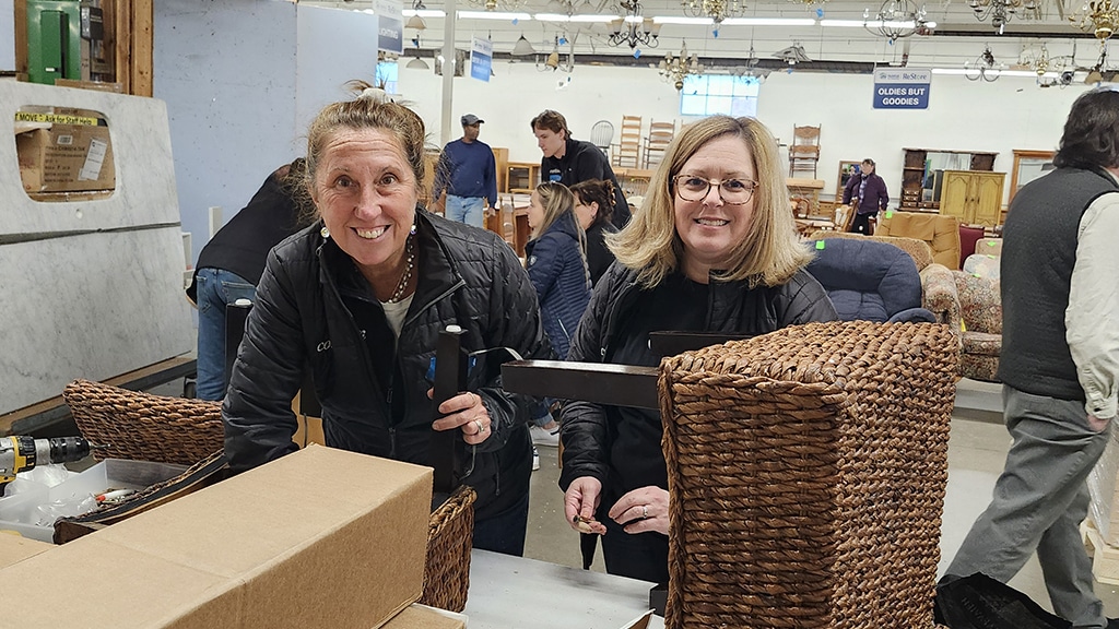 Love, Corbin team at the Habitat for Humanity "Light the Way Day" 2024