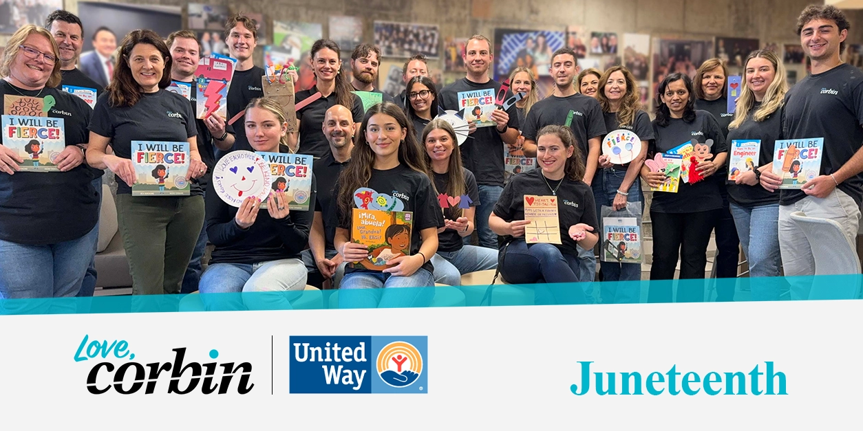 Love, Corbin Juneteenth 2025: Team Corbin holding books with crafts made for the United Way