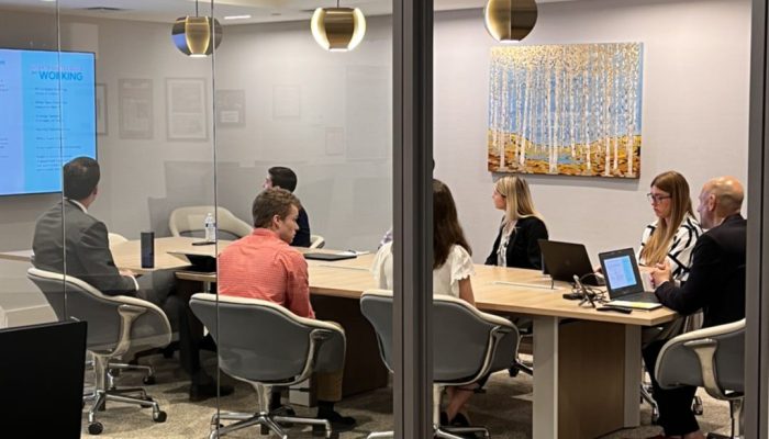 Corbin team members meeting in conference room at the Farmington, CT Headquarters
