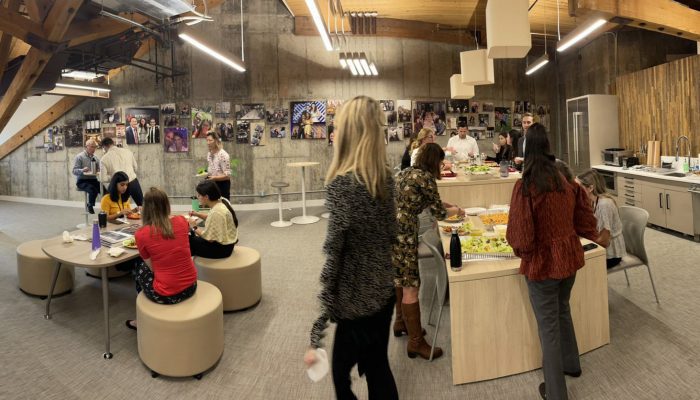Corbin employees gathering for lunch at the Farmington, CT Headquarters
